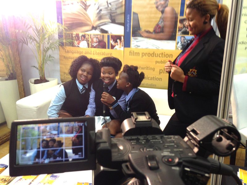 Potential students practicing video broadcast skills at NMMU Open Day 2014.